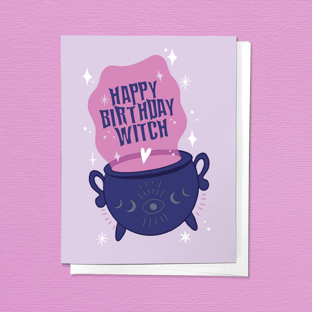 Image of folded greeting card with illustration of spooky cauldron, that says the phrase "Happy Birthday Witch"