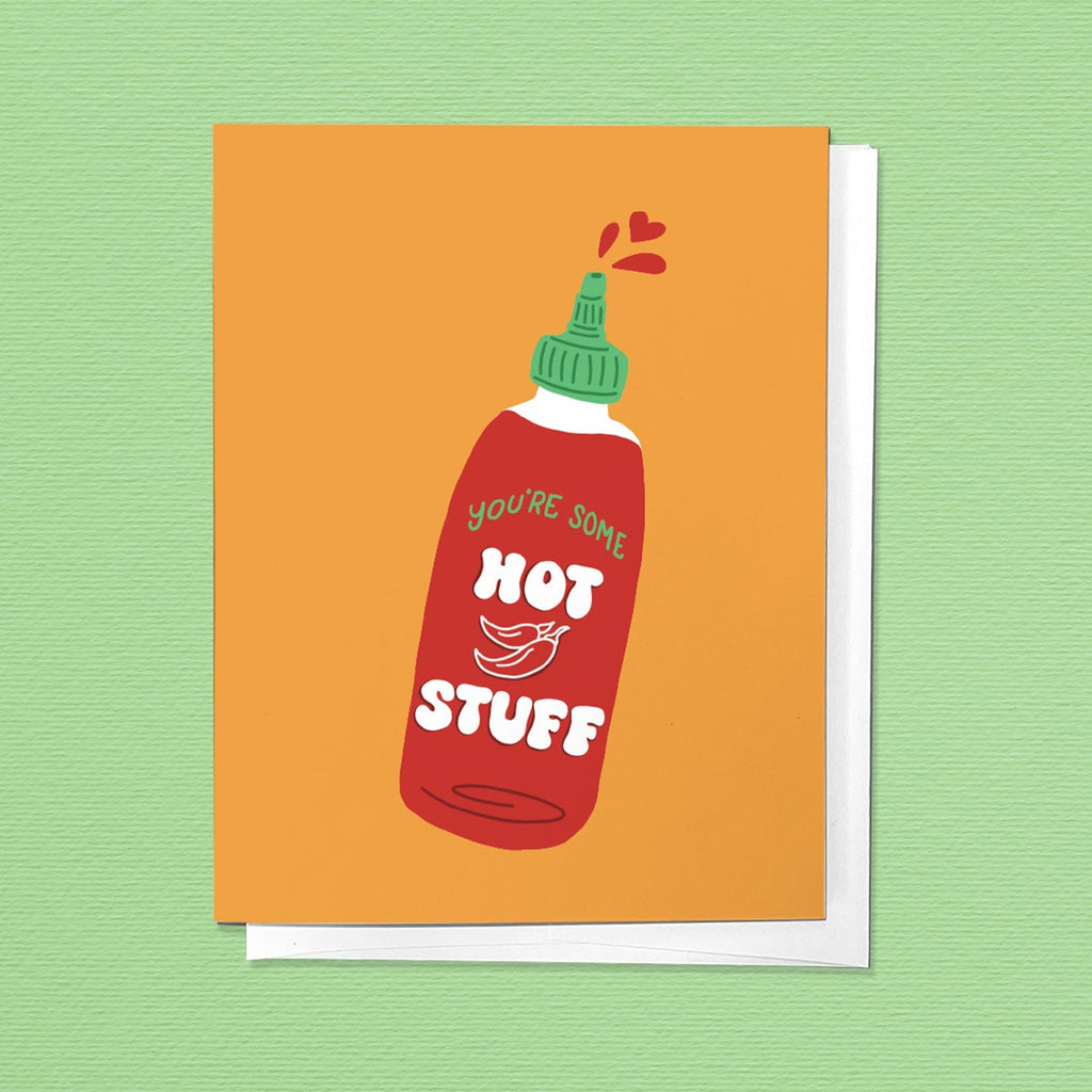 Image of folded greeting card with an image of a hot sauce bottle with the phrase "You're some hot stuff"